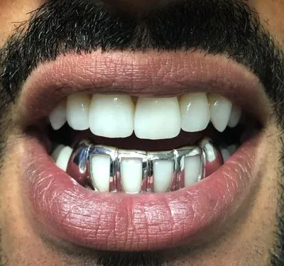 4 tooth grillz